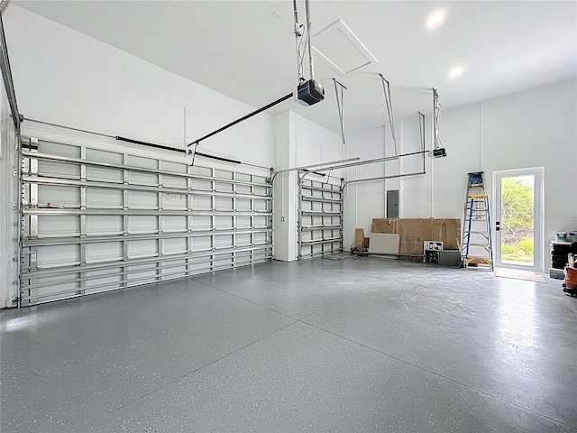 576 Mcdill Dr, Port Charlotte, FL 33953 - garage with electric panel and a garage door opener