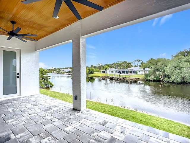 576 Mcdill Dr, Port Charlotte, FL 33953 - view of patio featuring ceiling fan, a water view, and a residential view