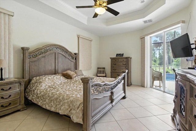 2329 Como St, Port Charlotte, FL 33948 - bedroom with access to outside, a raised ceiling, light tile patterned floors, ornamental molding, and ceiling fan