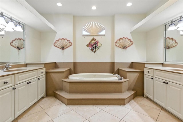2329 Como St, Port Charlotte, FL 33948 - bathroom with two vanities, tile patterned floors, a garden tub, and recessed lighting