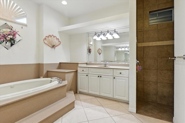 2329 Como St, Port Charlotte, FL 33948 - bathroom featuring a garden tub, vanity, tile patterned floors, and tiled shower
