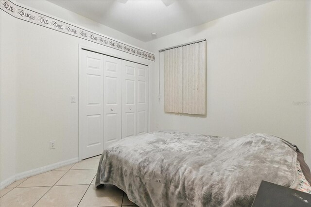 2329 Como St, Port Charlotte, FL 33948 - bedroom featuring light tile patterned floors and a closet