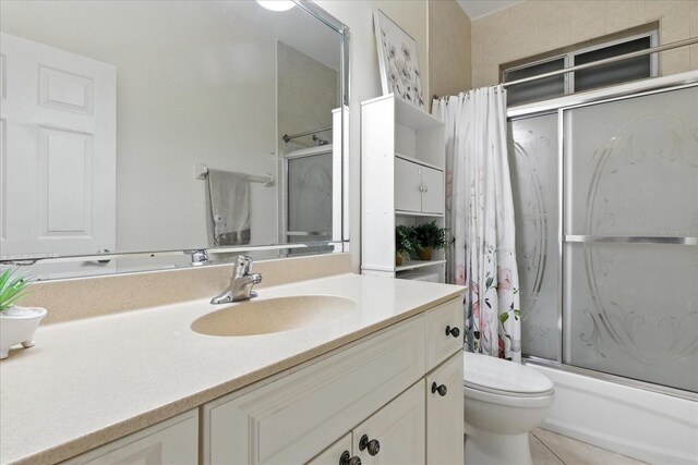 2329 Como St, Port Charlotte, FL 33948 - bathroom featuring vanity, shower / bath combination with curtain, and tile patterned floors