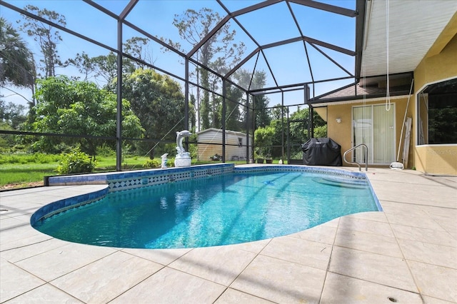 2329 Como St, Port Charlotte, FL 33948 - outdoor pool featuring a patio area, a storage shed, and a lanai