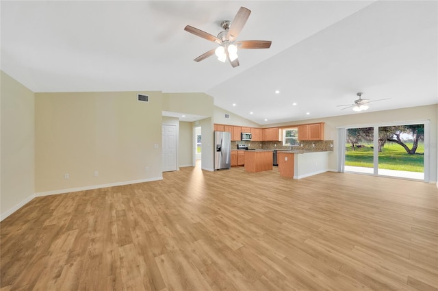 3993 NE Bobay Rd, Arcadia, FL 34266 - unfurnished living room featuring ceiling fan, lofted ceiling, light wood finished floors, and recessed lighting