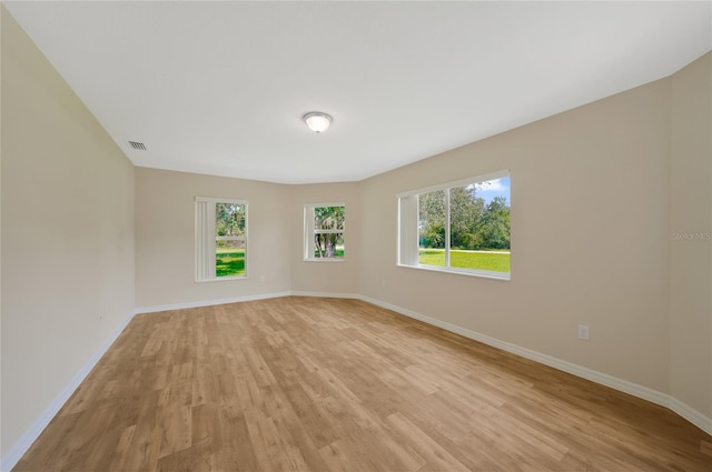 3993 NE Bobay Rd, Arcadia, FL 34266 - empty room featuring light wood finished floors and baseboards