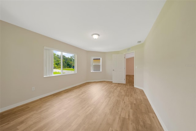 3993 NE Bobay Rd, Arcadia, FL 34266 - empty room with light wood finished floors and baseboards