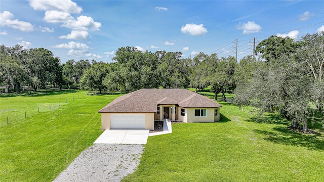 3993 NE Bobay Rd, Arcadia, FL 34266 - ranch-style home with stucco siding, driveway, a garage, and view of wooded area