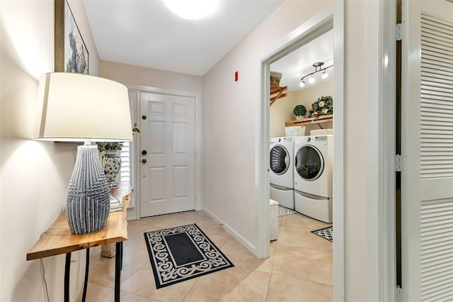 1250 W Marion Ave Unit 333, Punta Gorda, FL 33950 - laundry area featuring washer and clothes dryer and light tile patterned floors