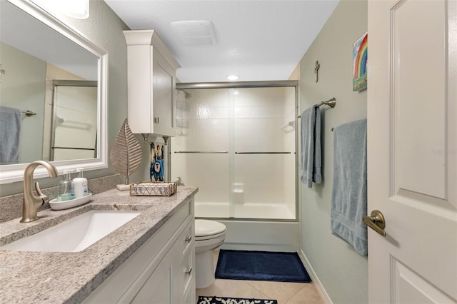 1250 W Marion Ave Unit 333, Punta Gorda, FL 33950 - full bath with vanity, tile patterned floors, and combined bath / shower with glass door