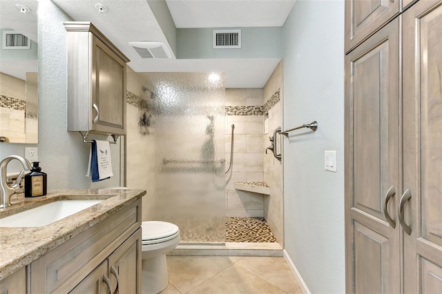 1250 W Marion Ave Unit 333, Punta Gorda, FL 33950 - bathroom featuring a shower stall, vanity, and tile patterned floors