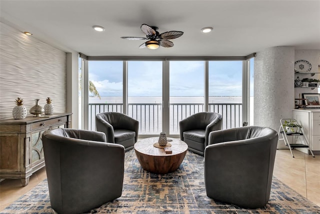 1250 W Marion Ave Unit 333, Punta Gorda, FL 33950 - living area featuring a ceiling fan, a water view, and healthy amount of natural light