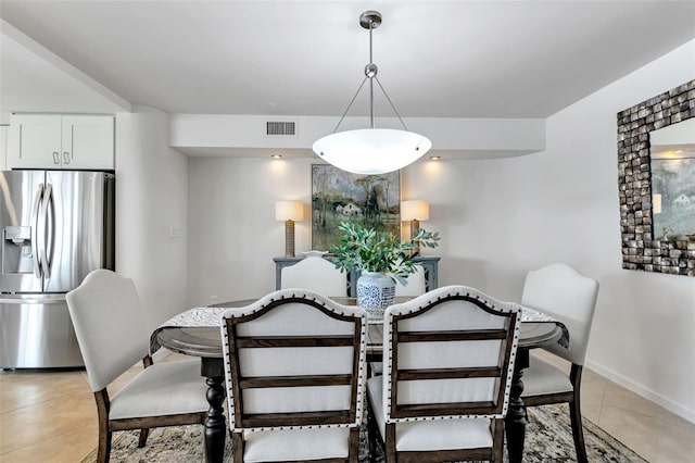 1250 W Marion Ave Unit 333, Punta Gorda, FL 33950 - dining space featuring light tile patterned floors and baseboards