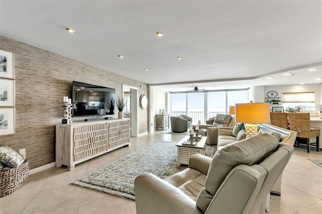 1250 W Marion Ave Unit 333, Punta Gorda, FL 33950 - living room featuring light tile patterned floors and a ceiling fan