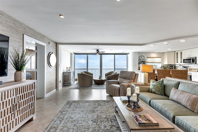 1250 W Marion Ave Unit 333, Punta Gorda, FL 33950 - living room featuring light tile patterned floors, ceiling fan, and recessed lighting