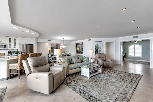 1250 W Marion Ave Unit 333, Punta Gorda, FL 33950 - living area featuring light tile patterned floors and recessed lighting