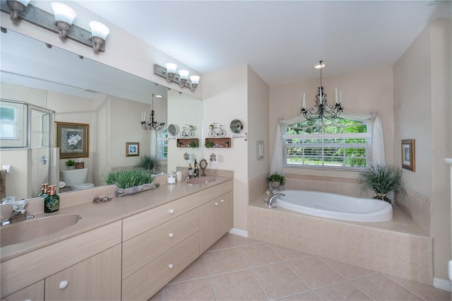 3824 Dominic St, North Port, FL 34288 - bathroom with a bath, double vanity, tile patterned floors, and a chandelier
