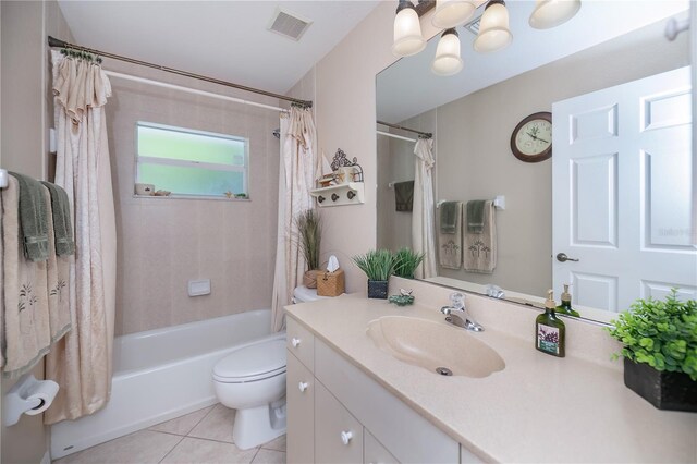 3824 Dominic St, North Port, FL 34288 - bathroom featuring vanity, tile patterned flooring, shower / bath combination with curtain, and a chandelier