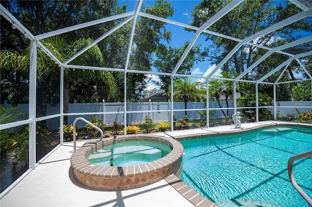 3824 Dominic St, North Port, FL 34288 - view of swimming pool with a fenced backyard, a pool with connected hot tub, a patio area, and glass enclosure