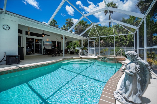 3824 Dominic St, North Port, FL 34288 - view of pool featuring ceiling fan, a patio area, a pool with connected hot tub, and a lanai