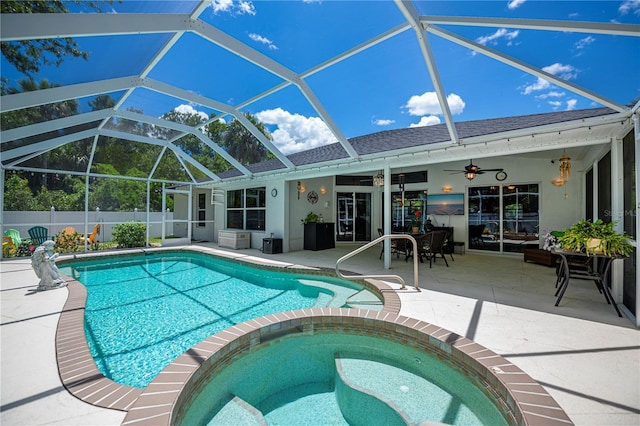 3824 Dominic St, North Port, FL 34288 - view of swimming pool with ceiling fan, a patio area, glass enclosure, and a pool with connected hot tub