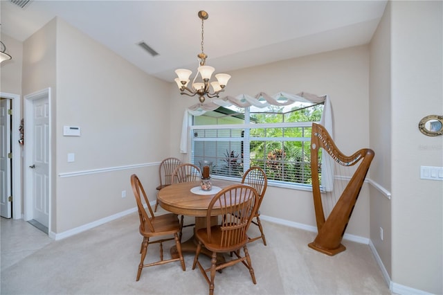 3824 Dominic St, North Port, FL 34288 - dining space featuring a chandelier and light carpet