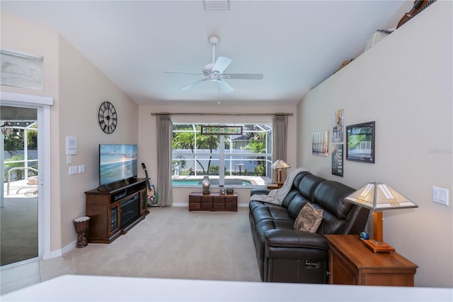 3824 Dominic St, North Port, FL 34288 - living room featuring a ceiling fan and carpet flooring