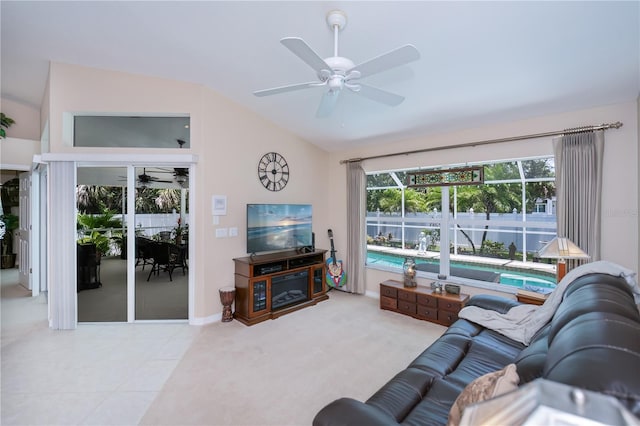 3824 Dominic St, North Port, FL 34288 - living room with ceiling fan, lofted ceiling, and tile patterned flooring
