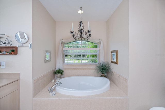 3824 Dominic St, North Port, FL 34288 - bathroom featuring a chandelier, a bath, and vanity