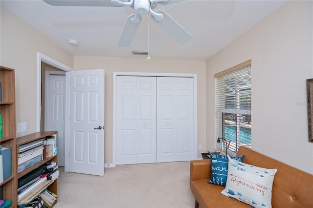 3824 Dominic St, North Port, FL 34288 - living area featuring a ceiling fan and light colored carpet