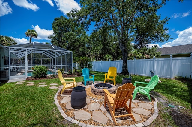 3824 Dominic St, North Port, FL 34288 - fenced backyard featuring an outdoor fire pit, an outdoor pool, a lanai, and a patio area