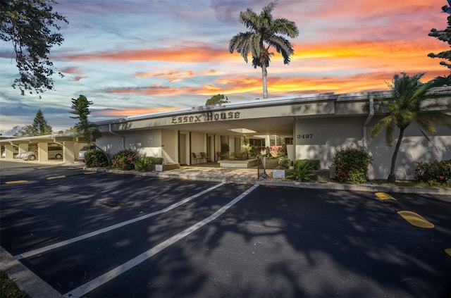 2437 Harbor Blvd Unit 114, Port Charlotte, FL 33952 - property at dusk with covered parking