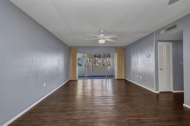 2437 Harbor Blvd Unit 114, Port Charlotte, FL 33952 - empty room featuring a ceiling fan, wood finished floors, and a textured ceiling
