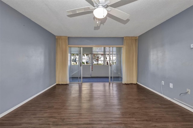 2437 Harbor Blvd Unit 114, Port Charlotte, FL 33952 - empty room with a ceiling fan, wood finished floors, and a textured ceiling