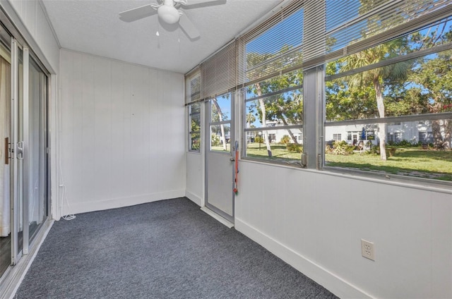 2437 Harbor Blvd Unit 114, Port Charlotte, FL 33952 - unfurnished sunroom with ceiling fan