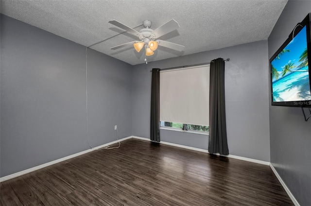2437 Harbor Blvd Unit 114, Port Charlotte, FL 33952 - spare room with a textured ceiling, wood finished floors, and ceiling fan