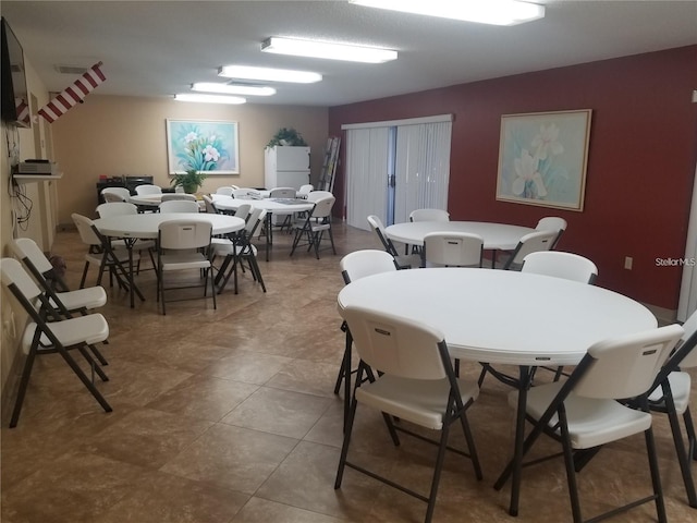 2437 Harbor Blvd Unit 114, Port Charlotte, FL 33952 - dining room with tile patterned floors