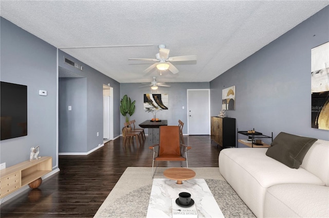 2437 Harbor Blvd Unit 114, Port Charlotte, FL 33952 - living room with a ceiling fan, wood finished floors, and a textured ceiling