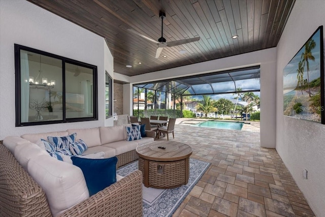 3800 Carupano Ct, Punta Gorda, FL 33950 - view of patio / terrace featuring an outdoor hangout area, an outdoor pool, a ceiling fan, and glass enclosure