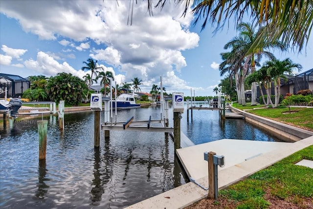 3800 Carupano Ct, Punta Gorda, FL 33950 - dock featuring boat lift and a water view