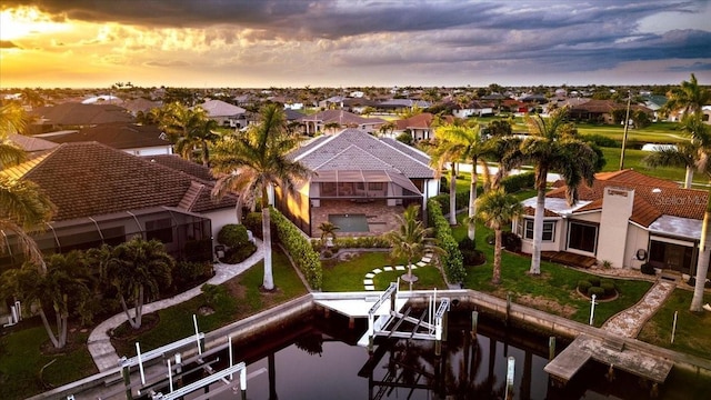 3800 Carupano Ct, Punta Gorda, FL 33950 - aerial view at dusk of a residential view and a water view