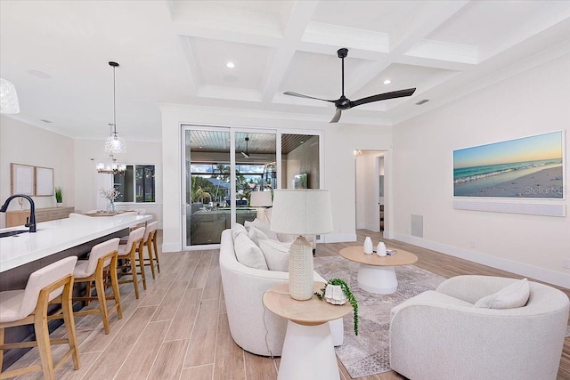 3800 Carupano Ct, Punta Gorda, FL 33950 - living room with coffered ceiling, beamed ceiling, light wood finished floors, ceiling fan, and ornamental molding
