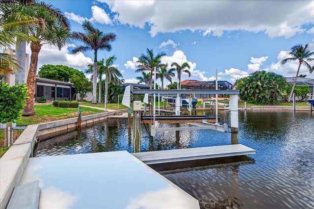 3800 Carupano Ct, Punta Gorda, FL 33950 - dock area featuring boat lift and a water view