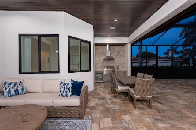 3800 Carupano Ct, Punta Gorda, FL 33950 - view of patio with area for grilling, an outdoor living space, beverage cooler, a lanai, and outdoor dining space