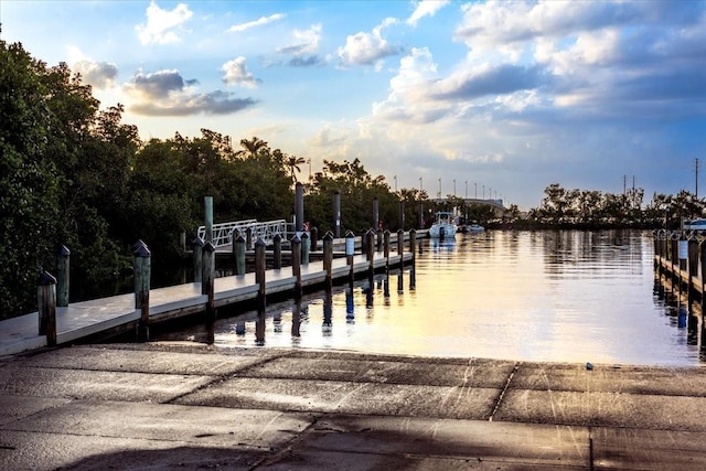 3800 Carupano Ct, Punta Gorda, FL 33950 - dock area featuring a boat ramp and a water view