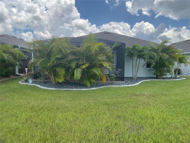 25228 E Lenox Cir, Punta Gorda, FL 33950 - view of front of home with a front lawn and stucco siding