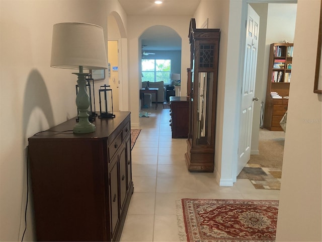 25228 E Lenox Cir, Punta Gorda, FL 33950 - corridor with light tile patterned flooring and arched walkways