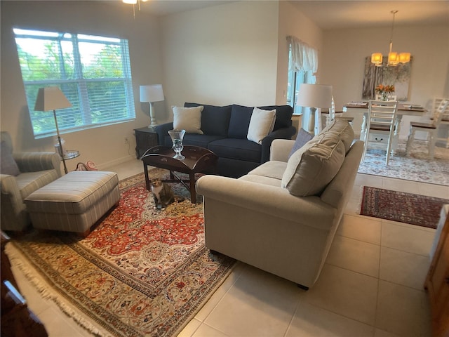 25228 E Lenox Cir, Punta Gorda, FL 33950 - living room with a chandelier and tile patterned floors