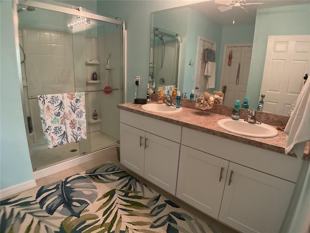 25228 E Lenox Cir, Punta Gorda, FL 33950 - full bath featuring a shower stall, double vanity, and ceiling fan