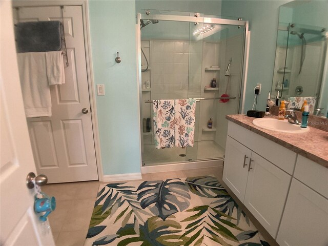 25228 E Lenox Cir, Punta Gorda, FL 33950 - bathroom with tile patterned floors, vanity, and a shower stall